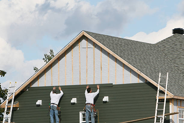 Professional Wood Siding technician working in Plainville, CT